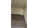 Modern living room boasts stylish gray wood-look floors at 3412 Townhouse Dr, Las Vegas, NV 89121