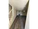 Spacious living room with a stairway and multiple hallways at 3412 Townhouse Dr, Las Vegas, NV 89121