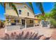 Backyard featuring a covered patio, built-in BBQ, and a shed with a rock landscape at 3437 Visionary Bay Ave, North Las Vegas, NV 89081