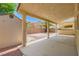Covered patio area with built-in BBQ, a shed, and a low maintenance gravel yard at 3437 Visionary Bay Ave, North Las Vegas, NV 89081