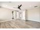 The interior design of the room boasts three doors and a modern ceiling fan at 3437 Visionary Bay Ave, North Las Vegas, NV 89081