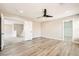 View of an empty bedroom with hard wood floors and a closet with white doors at 3437 Visionary Bay Ave, North Las Vegas, NV 89081
