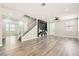 Spacious living room featuring hardwood floors, recessed lighting, and an electric fireplace at 3437 Visionary Bay Ave, North Las Vegas, NV 89081