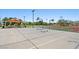 Multi-court basketball area featuring covered picnic tables and well-maintained asphalt at 3708 Fuselier Dr, North Las Vegas, NV 89032