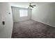 Spacious bedroom with neutral carpet and a large window offering plenty of natural light at 3708 Fuselier Dr, North Las Vegas, NV 89032
