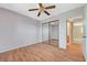 Bedroom featuring wood-look floors and a sliding mirror closet at 4280 Cicada Way, Las Vegas, NV 89121