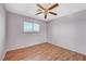 Bedroom with wood-look floors and a ceiling fan for added comfort at 4280 Cicada Way, Las Vegas, NV 89121