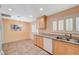 Cozy dining area with tile flooring, shuttered windows, and elegant chandelier at 4280 Cicada Way, Las Vegas, NV 89121