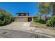 Charming home features a two-car garage and desert landscaping at 4280 Cicada Way, Las Vegas, NV 89121