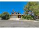 Two-story home features a two-car garage and desert landscaping at 4280 Cicada Way, Las Vegas, NV 89121