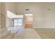 Open living area with tile floors, carpet, and natural light at 4280 Cicada Way, Las Vegas, NV 89121