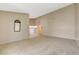Spacious living room with carpet and neutral paint at 4280 Cicada Way, Las Vegas, NV 89121