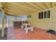 Backyard patio with built-in grill and stone picnic table at 4280 Cicada Way, Las Vegas, NV 89121