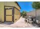Exterior shot of pool equipment, shed, and block wall of backyard at 4280 Cicada Way, Las Vegas, NV 89121