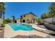Large swimming pool with diving board and slide, set in a private backyard oasis at 4280 Cicada Way, Las Vegas, NV 89121