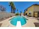 Sparkling swimming pool with a diving board and slide, surrounded by lush landscaping at 4280 Cicada Way, Las Vegas, NV 89121