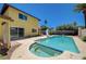 Backyard with a pool features a slide, spa, and ample space for outdoor entertaining at 4280 Cicada Way, Las Vegas, NV 89121