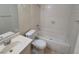 Bathroom showcasing a vanity, toilet, and bathtub, arranged in a compact space with practical fixtures at 4300 N Lamont St # 232, Las Vegas, NV 89115