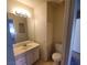Bathroom featuring a vanity with a sink, a toilet, and a mirror with good lighting, providing a functional space at 4300 N Lamont St # 232, Las Vegas, NV 89115