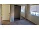 The bedroom features neutral walls, carpet flooring, and a sliding mirrored closet at 4300 N Lamont St # 232, Las Vegas, NV 89115