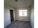 Well-lit bedroom features a closet and a large window at 4300 N Lamont St # 232, Las Vegas, NV 89115
