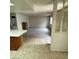 View of kitchen, flooring, and appliances leading into living area at 4300 N Lamont St # 232, Las Vegas, NV 89115
