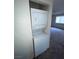 Stackable washer and dryer are neatly installed in a space-saving design, offering laundry convenience at 4300 N Lamont St # 232, Las Vegas, NV 89115