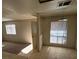 This living space has carpet and tile flooring, windows with blinds, and neutral paint at 4300 N Lamont St # 232, Las Vegas, NV 89115