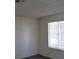 Bright bedroom with a large window at 4451 Rich Dr # D, Las Vegas, NV 89102