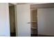 A bedroom closet with shelving and a sliding door with a mirror at 4451 Rich Dr # D, Las Vegas, NV 89102