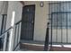 Close up showing door D of the building with a metal security door at 4451 Rich Dr # D, Las Vegas, NV 89102