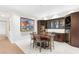 Entertaining space with custom cabinetry, beverage cooler, and ample dining space at 4471 Dean Martin Dr # 1707, Las Vegas, NV 89103