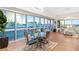 Bright dining area with floor-to-ceiling windows showcasing spectacular city views at 4471 Dean Martin Dr # 1707, Las Vegas, NV 89103