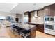 Modern kitchen with a large island, stainless appliances, and unique backsplash at 4471 Dean Martin Dr # 1707, Las Vegas, NV 89103