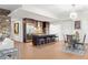 Open kitchen and dining area with granite countertops, stainless appliances, and modern finishes at 4471 Dean Martin Dr # 1707, Las Vegas, NV 89103