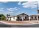 Charming single-story home featuring a landscaped front yard and a stone accent base at 4676 E Alexander Rd, Las Vegas, NV 89115