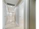 Hallway featuring neutral walls and marble tile flooring at 4676 E Alexander Rd, Las Vegas, NV 89115