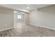 Living room with hardwood flooring, recessed lighting, and an open floor plan at 4676 E Alexander Rd, Las Vegas, NV 89115