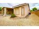 This home features a covered patio and low-maintenance gravel landscaping at 4717 Mohawk River Ave, North Las Vegas, NV 89031
