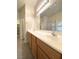 Double sink vanity in bathroom with separate walk-in closet and walk-in shower at 4717 Mohawk River Ave, North Las Vegas, NV 89031