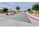 View of the community entrance with manicured landscaping at Riverwalk Ranch Manor at 4717 Mohawk River Ave, North Las Vegas, NV 89031