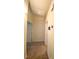 Hallway features a neutral wall, carpet, and updated thermostat at 4717 Mohawk River Ave, North Las Vegas, NV 89031