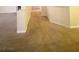 Neutral hallway with base trim leading to other rooms in the home at 4717 Mohawk River Ave, North Las Vegas, NV 89031