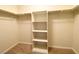 Walk-in closet with shelving at 4717 Mohawk River Ave, North Las Vegas, NV 89031