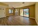 Living room offers sliding glass doors with a view of the community pool and bright natural light at 4805 Nara Vista Way # 203, Las Vegas, NV 89103