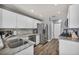 Spacious kitchen featuring stainless steel appliances and granite countertops at 5024 Starfinder Ave, Las Vegas, NV 89108