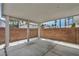 Private, covered patio with brick surround providing a charming outdoor space at 5024 Starfinder Ave, Las Vegas, NV 89108