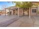 Large covered outdoor patio featuring stone accents and concrete flooring is perfect for entertaining at 5193 N Miller Ln, Las Vegas, NV 89149