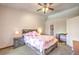 Comfortable bedroom with neutral walls, ceiling fan, and ample space at 520 Arrowhead Trl # 522, Henderson, NV 89015