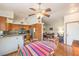 Open kitchen area with stainless steel appliances and adjacent living area at 520 Arrowhead Trl # 522, Henderson, NV 89015